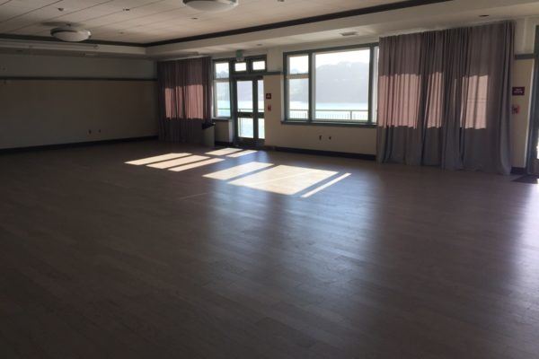 Spacious Lake Merced Boathouse event venue with natural light for meetings and gatherings.