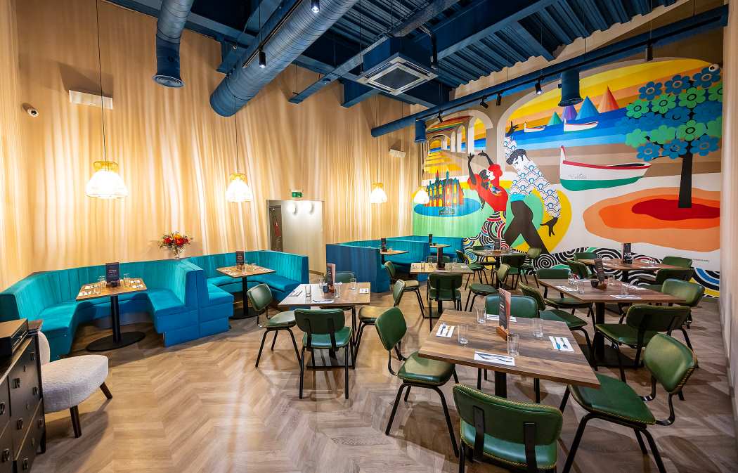 Vibrant event space with colorful decor, perfect for gatherings and social functions.
