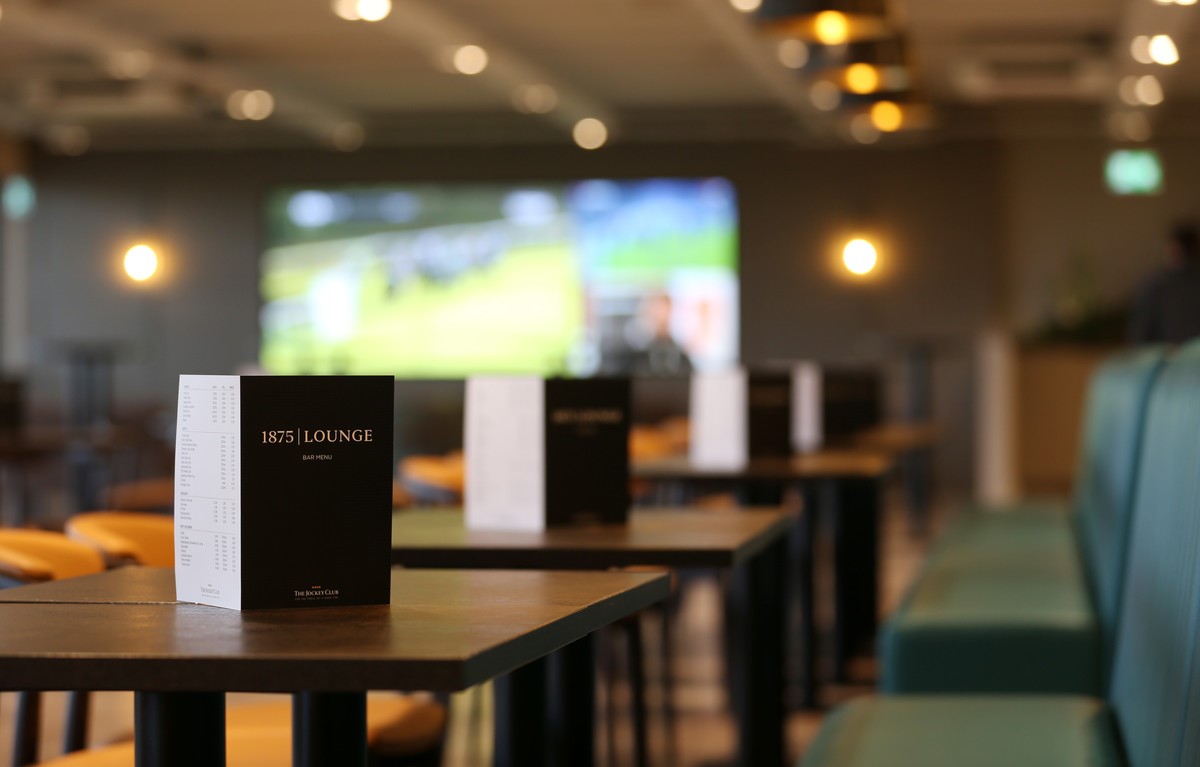 Modern lounge at Sandown Park Racecourse, ideal for meetings and events.