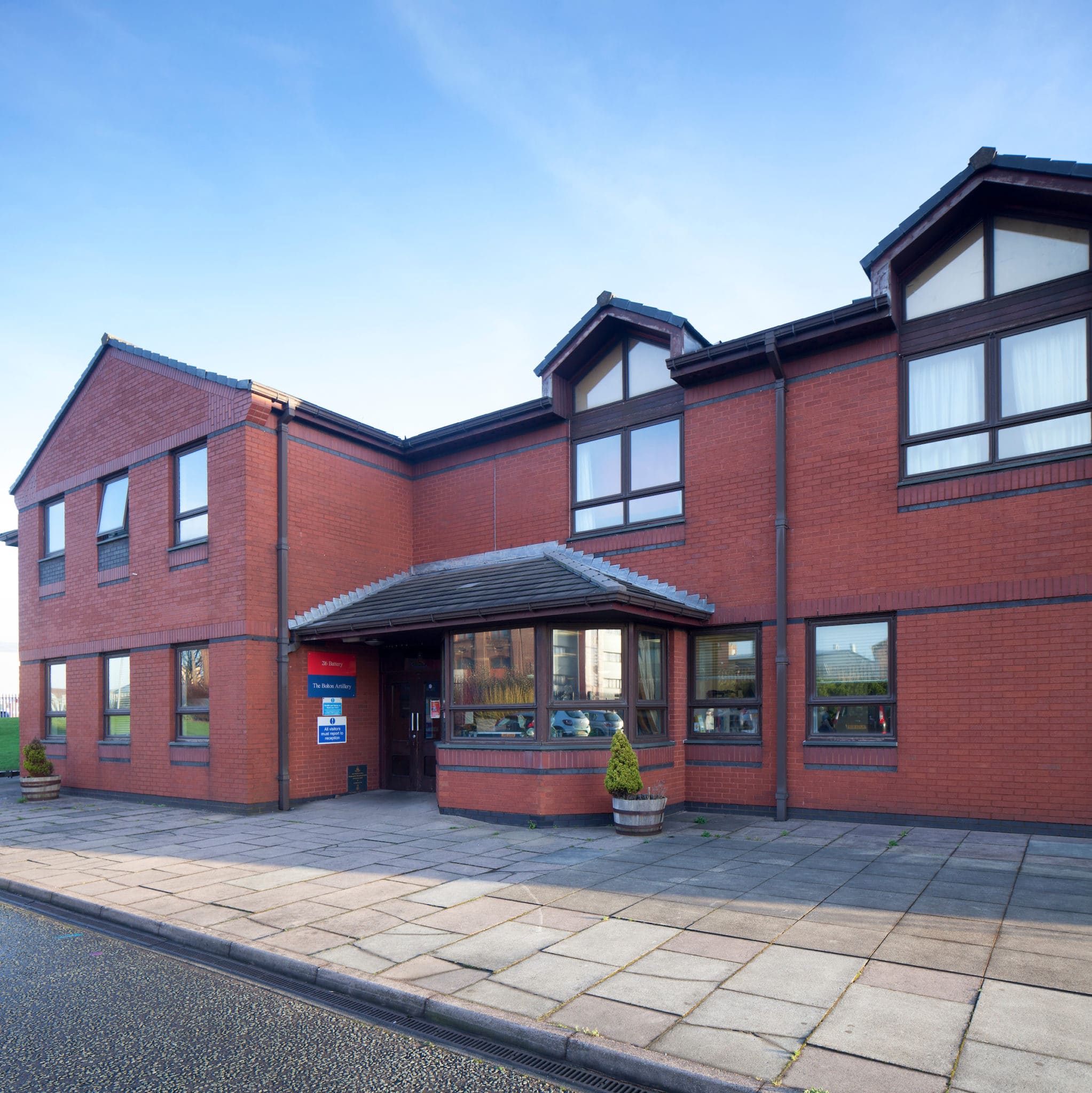 Mather Avenue Army Reserve Centre, modern brick venue for meetings and events.