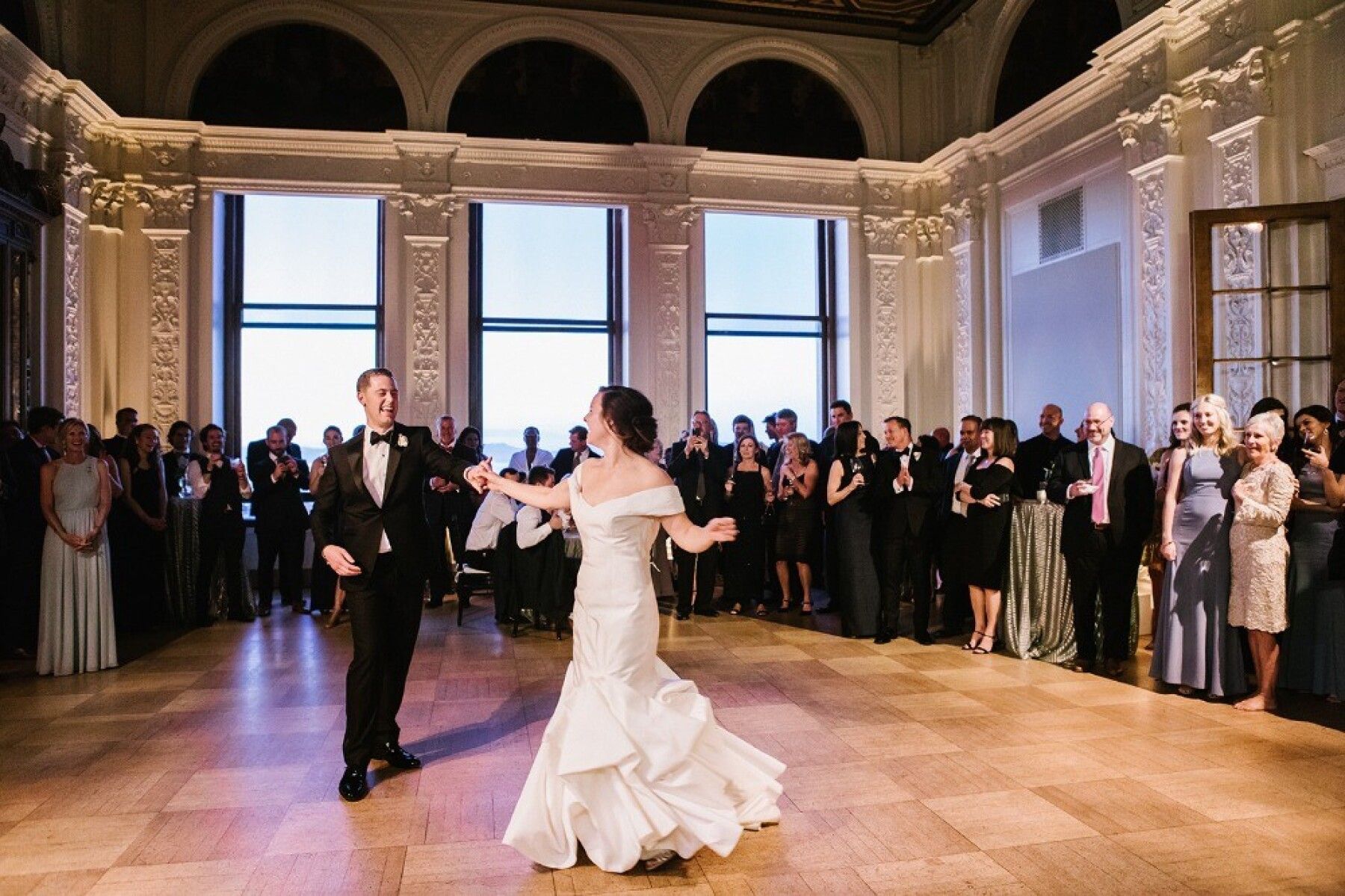 Elegant wedding reception in James Leary Flood Mansion with couple's first dance.