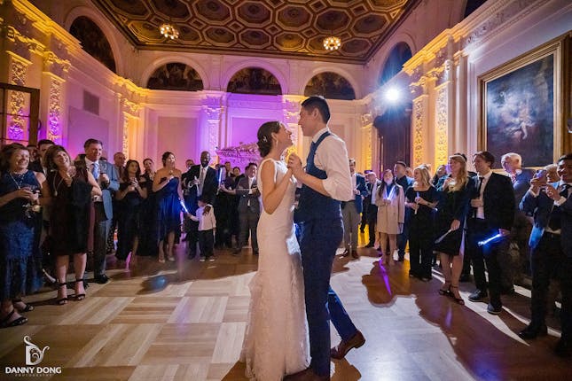 Wedding reception in elegant Flood Mansion ballroom with couple's first dance.