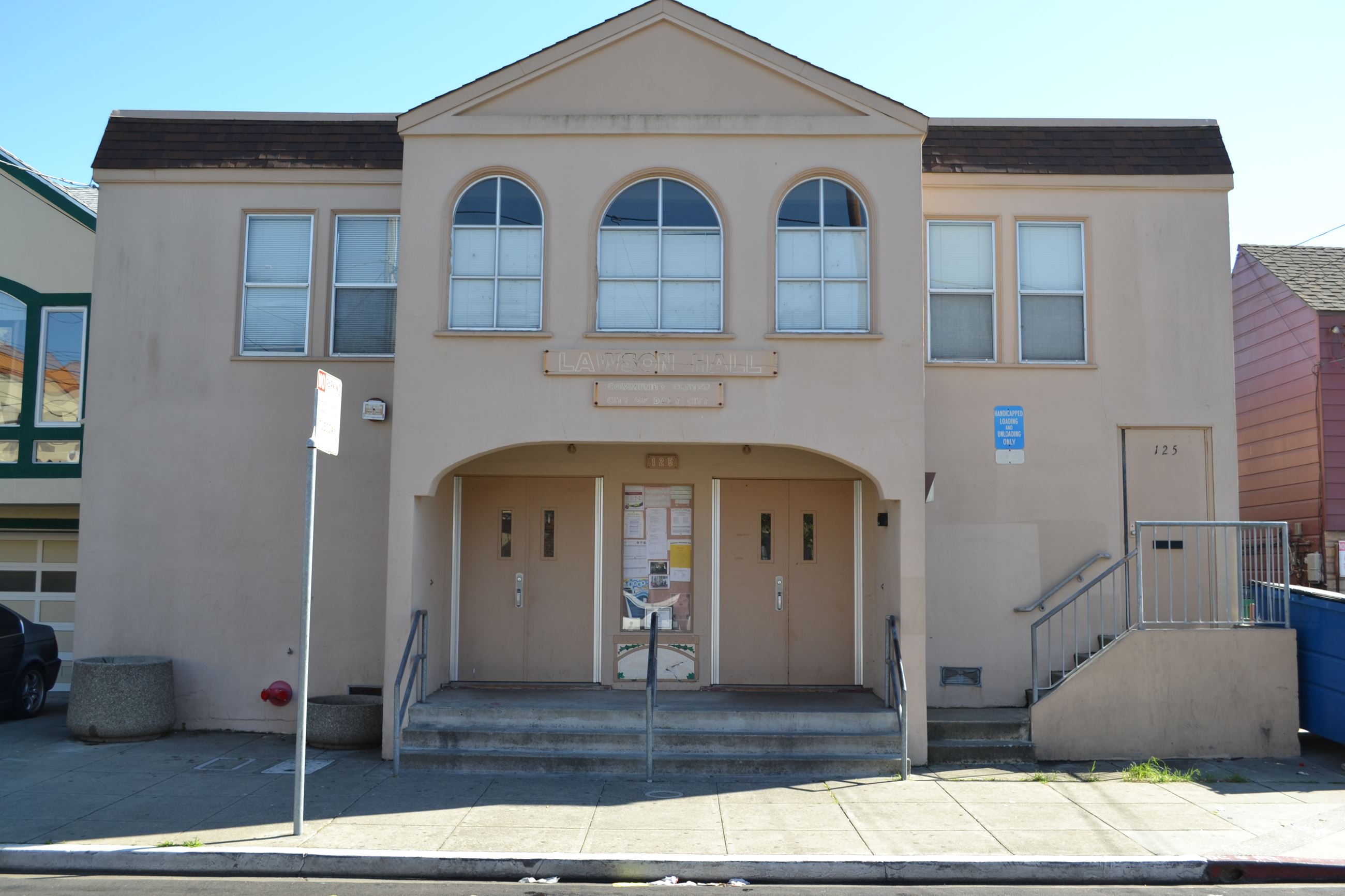Daly City Hall exterior with wide steps, ideal for community events and workshops.