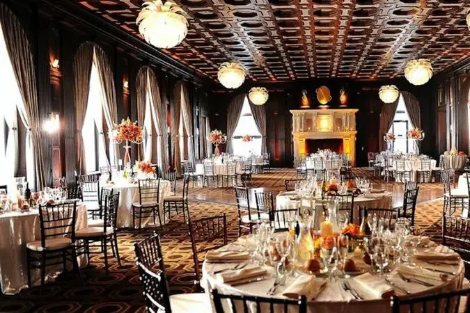 Elegant Julia Morgan Ballroom with round tables, ideal for weddings and corporate events.
