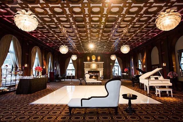Elegant Julia Morgan Ballroom with grand piano, ideal for upscale events and gatherings.