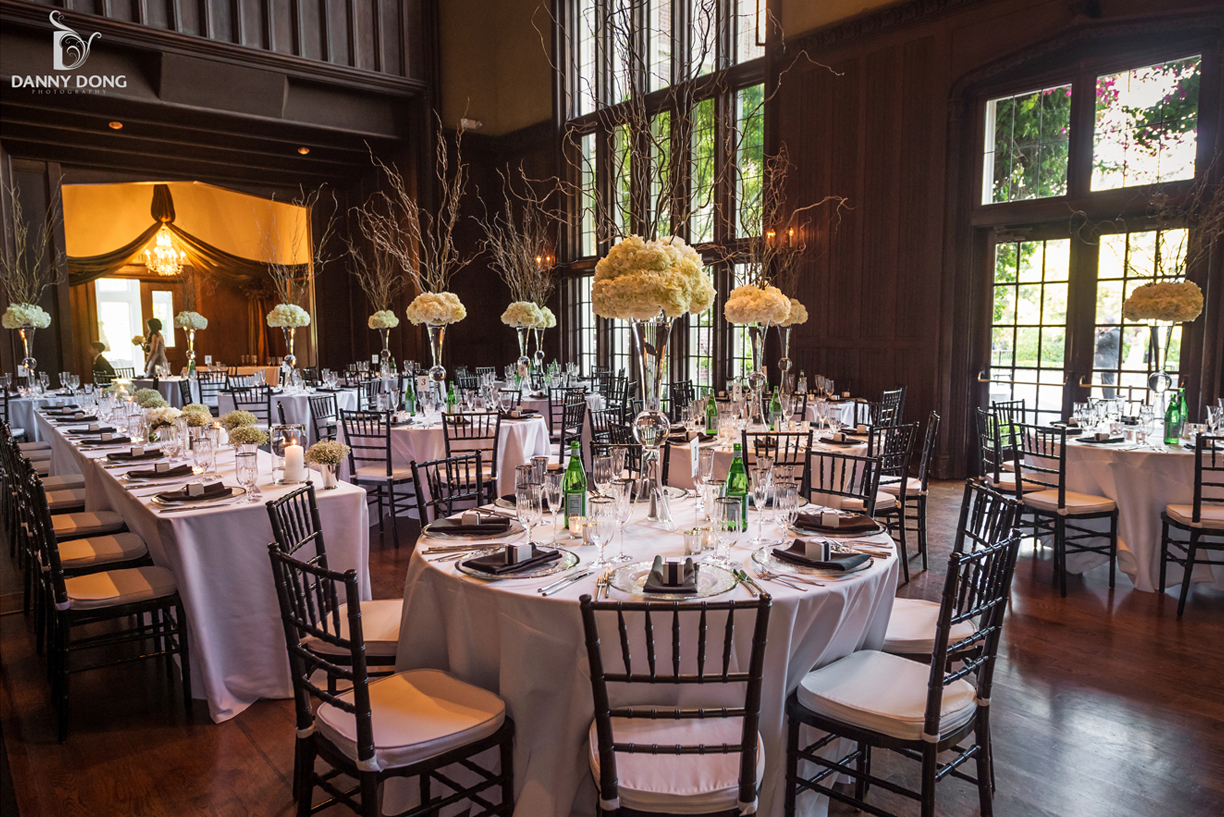 Great Hall in Kohl Mansion with elegant tables and floral centerpieces for weddings and events.