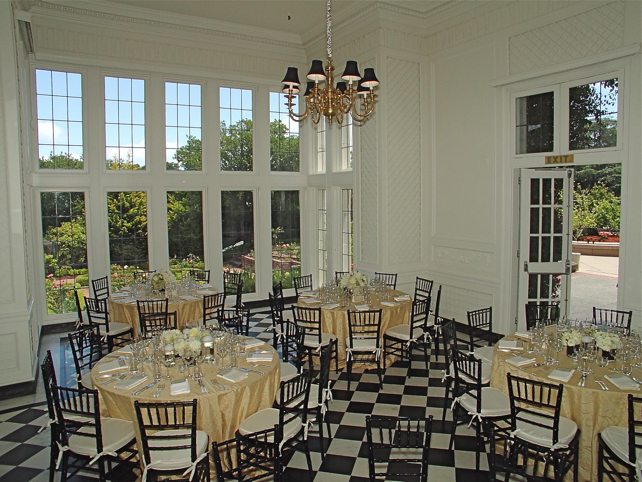 Elegant Kohl Mansion Morning Room with gold linens, ideal for weddings and corporate events.