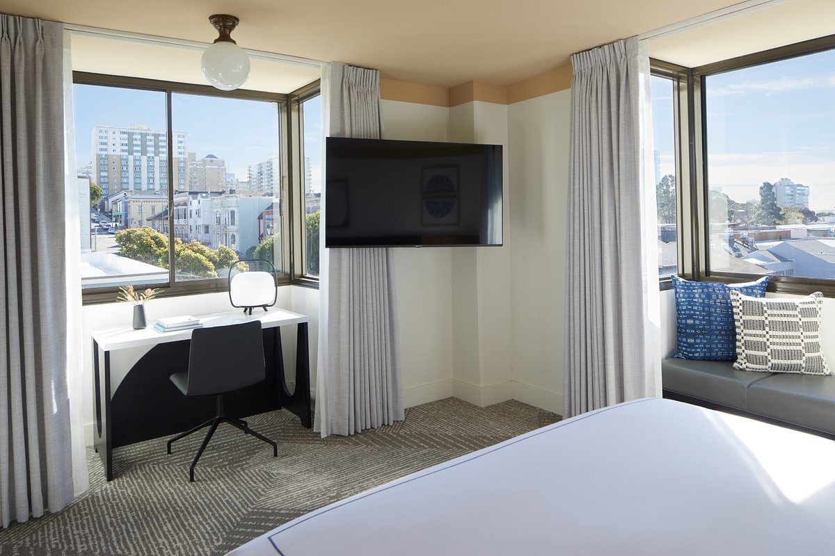 Japantown Hotel room with large windows, ideal for meetings and events.