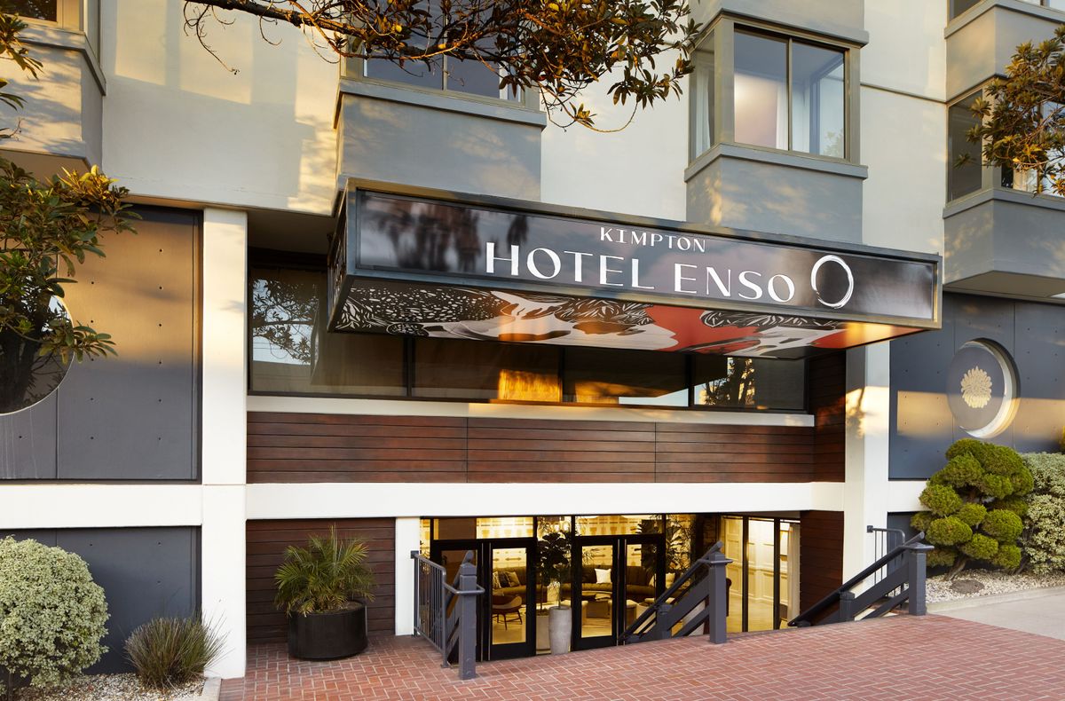 Modern entrance of Kimpton Hotel Enso, perfect for meetings and events.