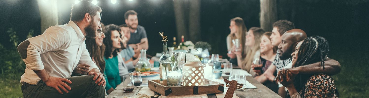 Elstree Studios outdoor event setup with warm lighting for networking and team-building.