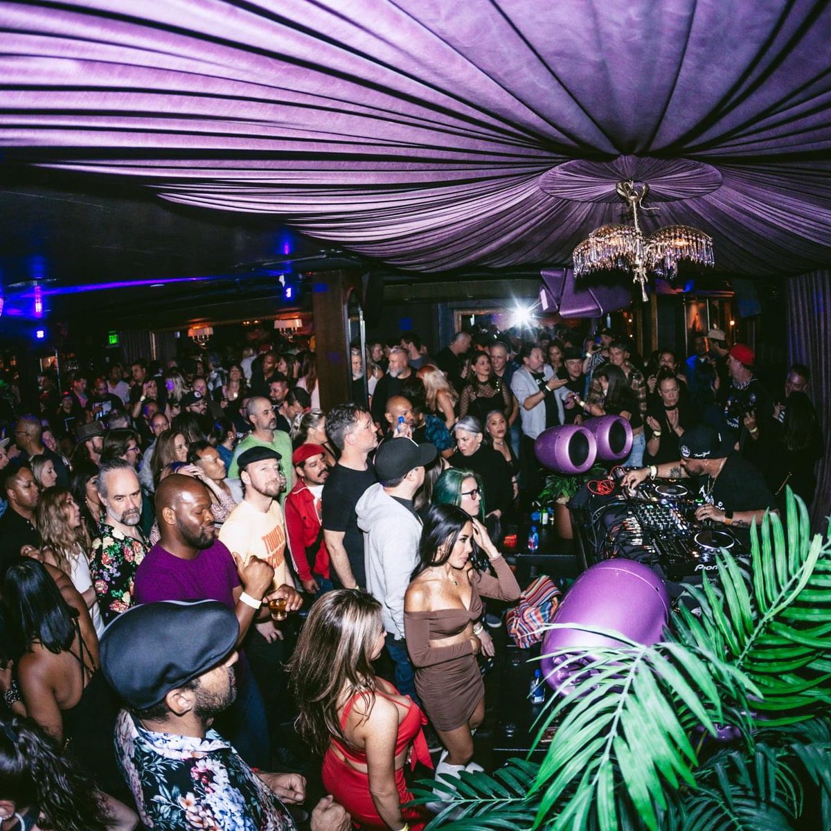 Vibrant crowd at Hawthorn SF Nightclub, showcasing dynamic lighting and entertainment.