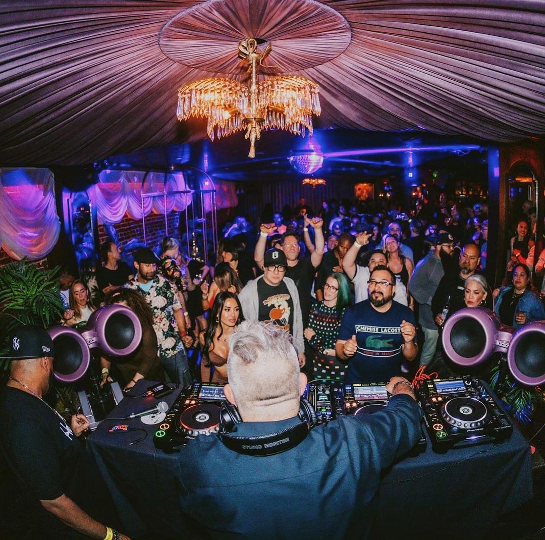 Hawthorn Private Event Space with vibrant nightlife, DJ, and colorful lighting for parties.