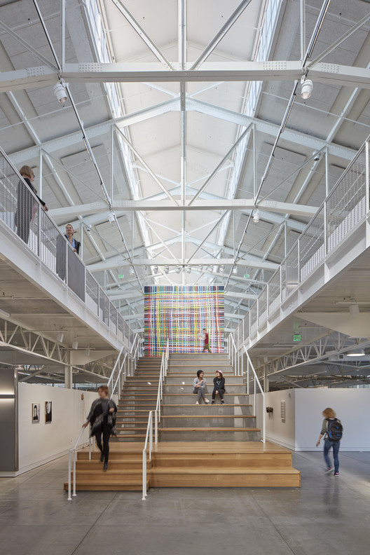 Fort Mason Auditorium: modern venue with high ceilings for events and gatherings.