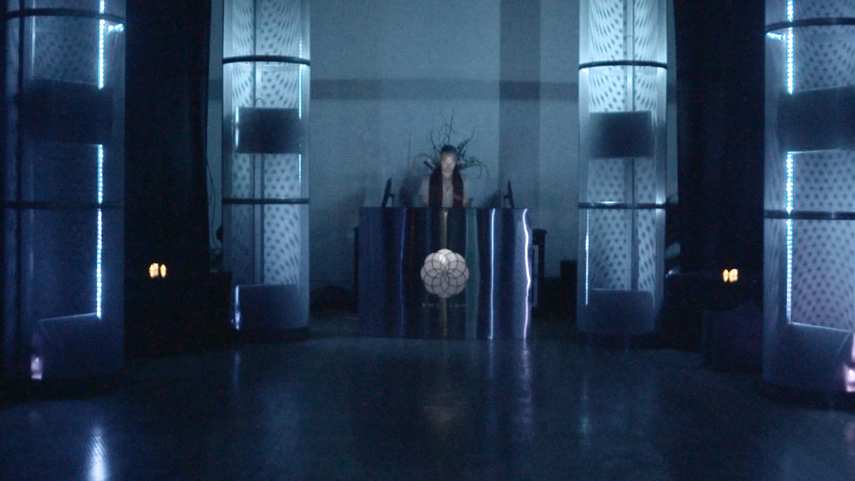 Sleek event space with blue lighting, ideal for corporate events and presentations.