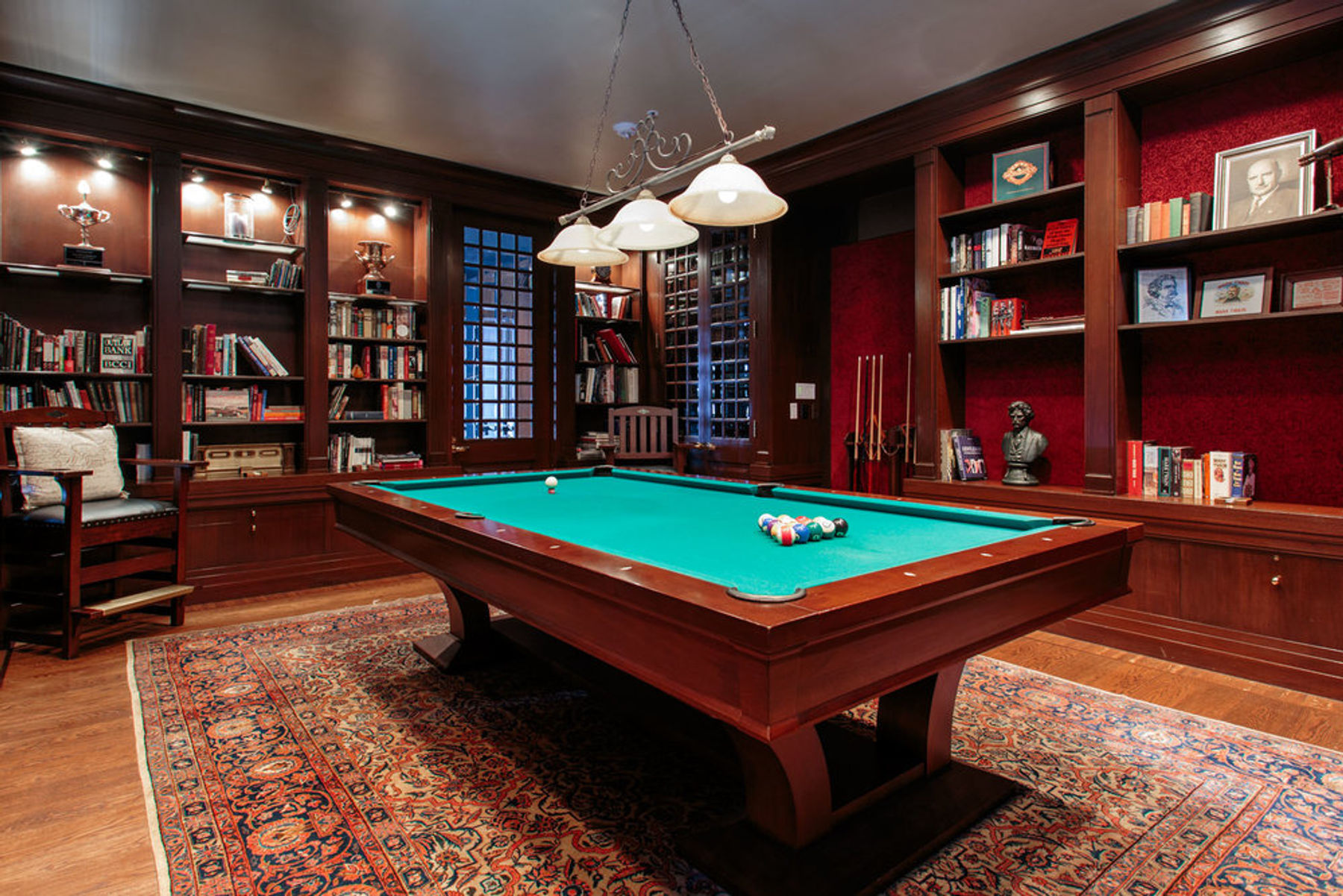 Sophisticated billiards room with pool table for networking events and team-building activities.