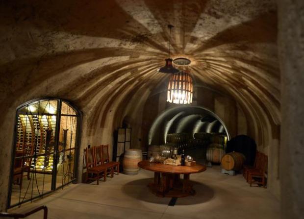 Wine Cave in Amador Club: elegant wine cellar with arched ceilings for private tastings.