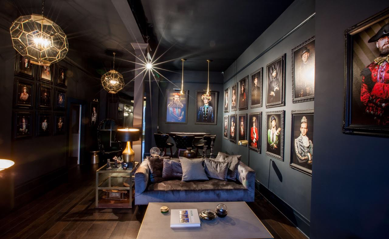 Stylish event space with plush sofa, ideal for gatherings and networking in The Academy SF.