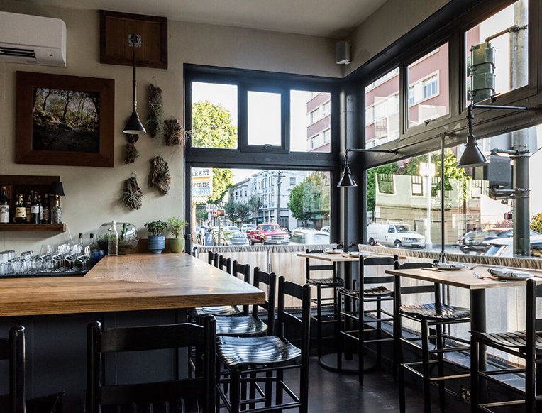 Private dining room at Rich Table with large windows, ideal for small events and meetings.