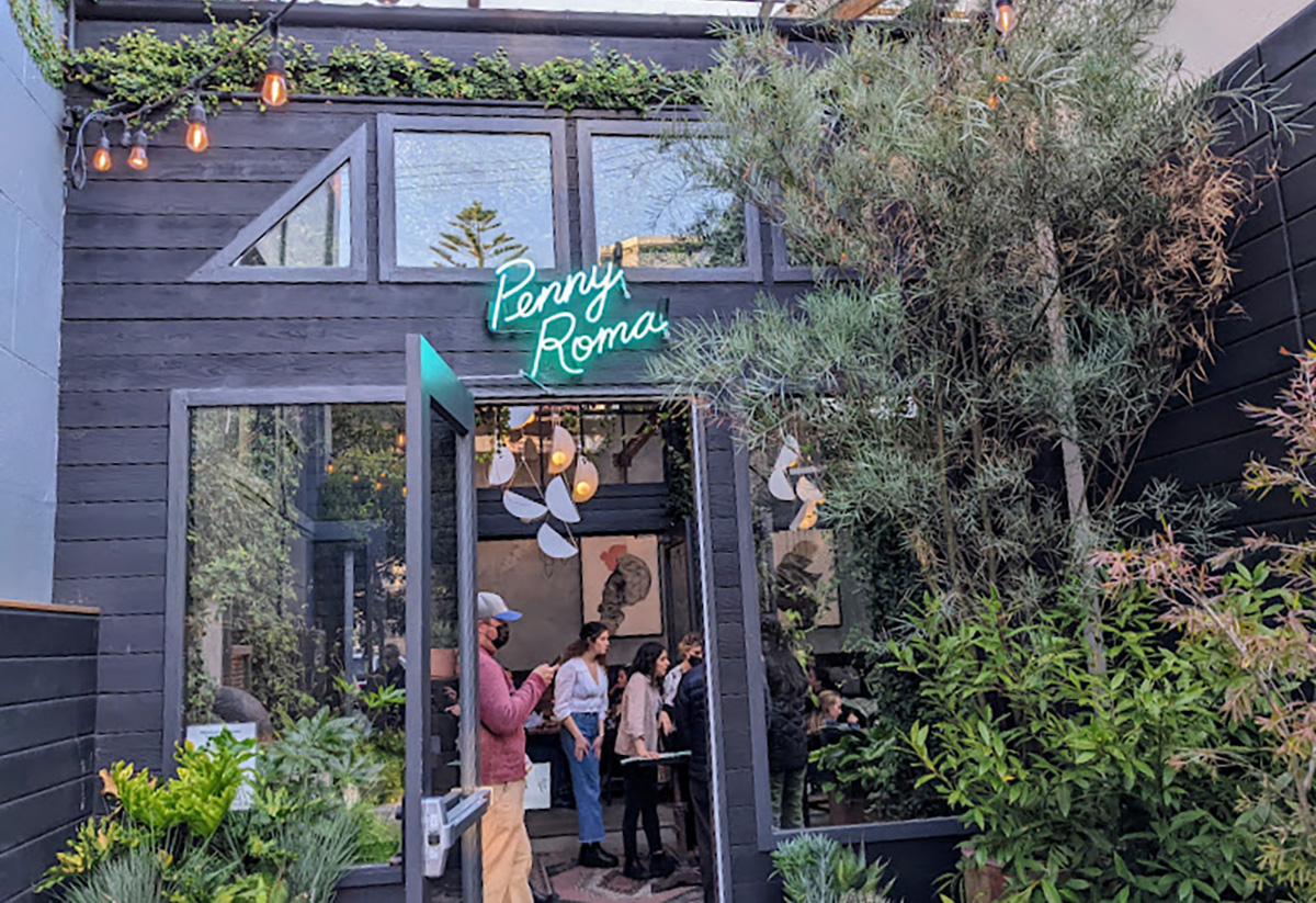 Private dining room at Penny Roma, modern decor for intimate gatherings and events.