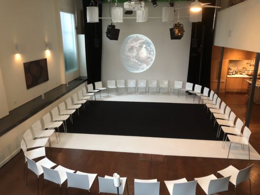 Circular seating in The Producer's Loft for engaging workshops and events.