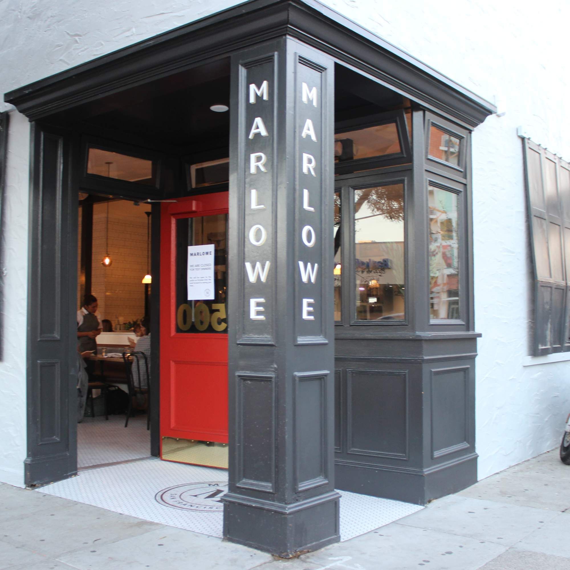 Welcoming entrance of Patio in Marlowe with bold signage, perfect for events and meetings.