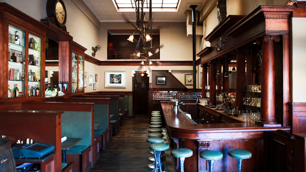 Charming Marlowe venue with wooden furnishings for intimate gatherings and networking events.