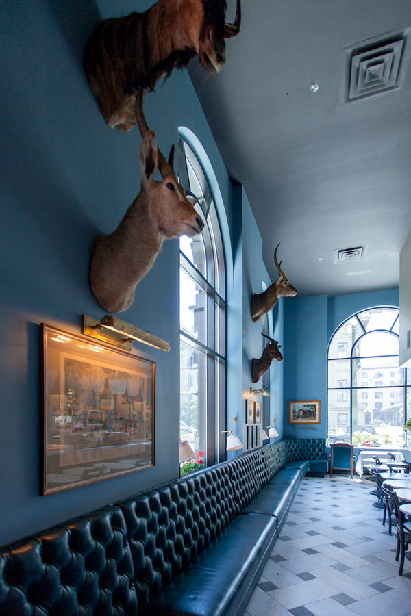 Sophisticated Blue Bar venue with rustic decor, perfect for events and gatherings.