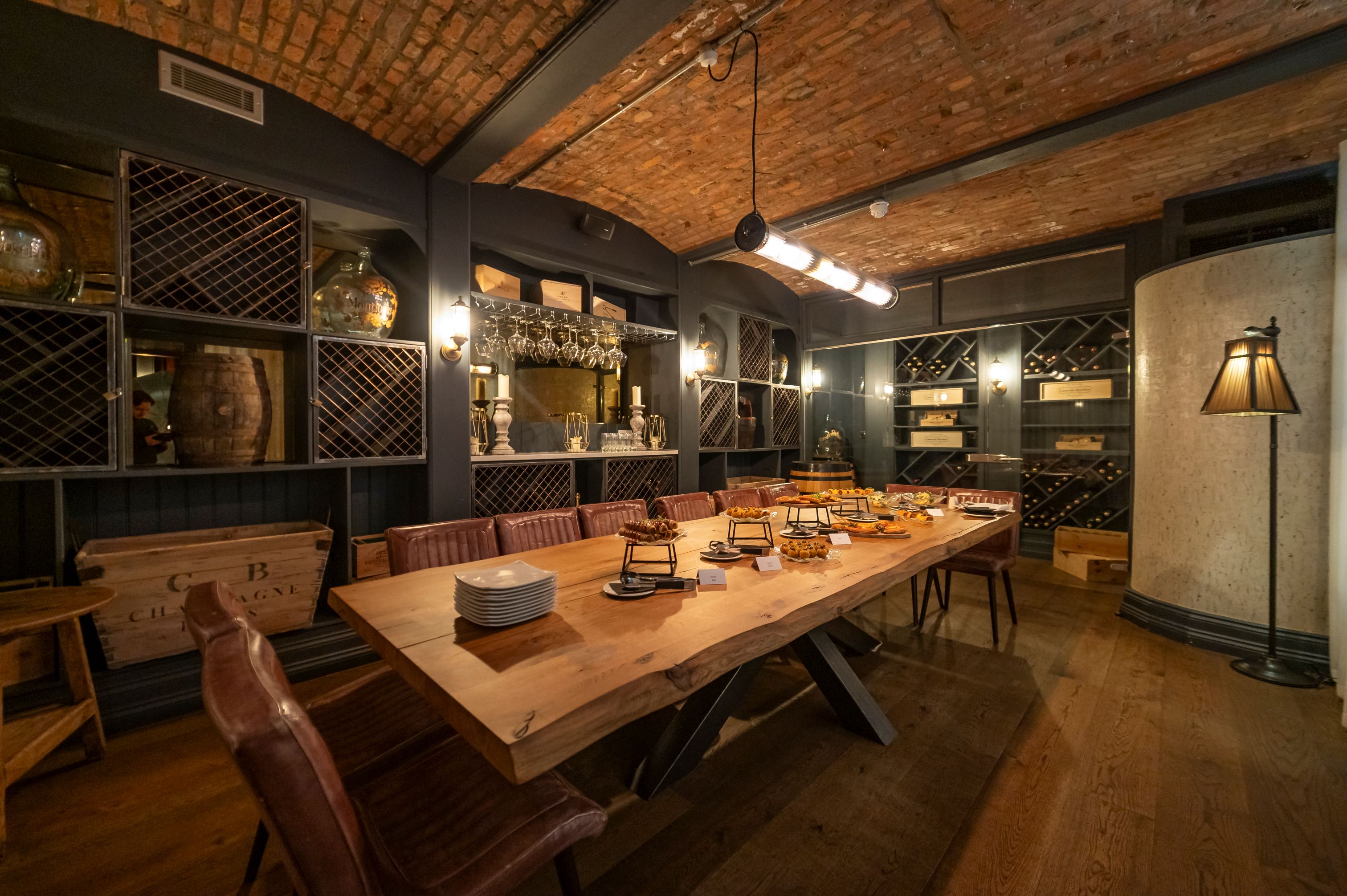 Stylish meeting space with wooden table and leather chairs at King Street Townhouse.