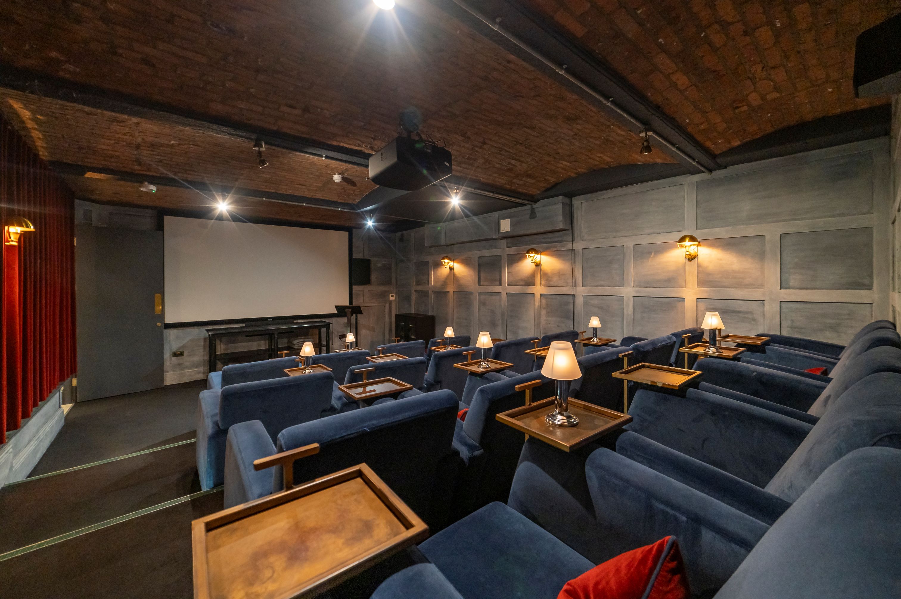 Cozy screening room at The Cellars, ideal for private film events and presentations.