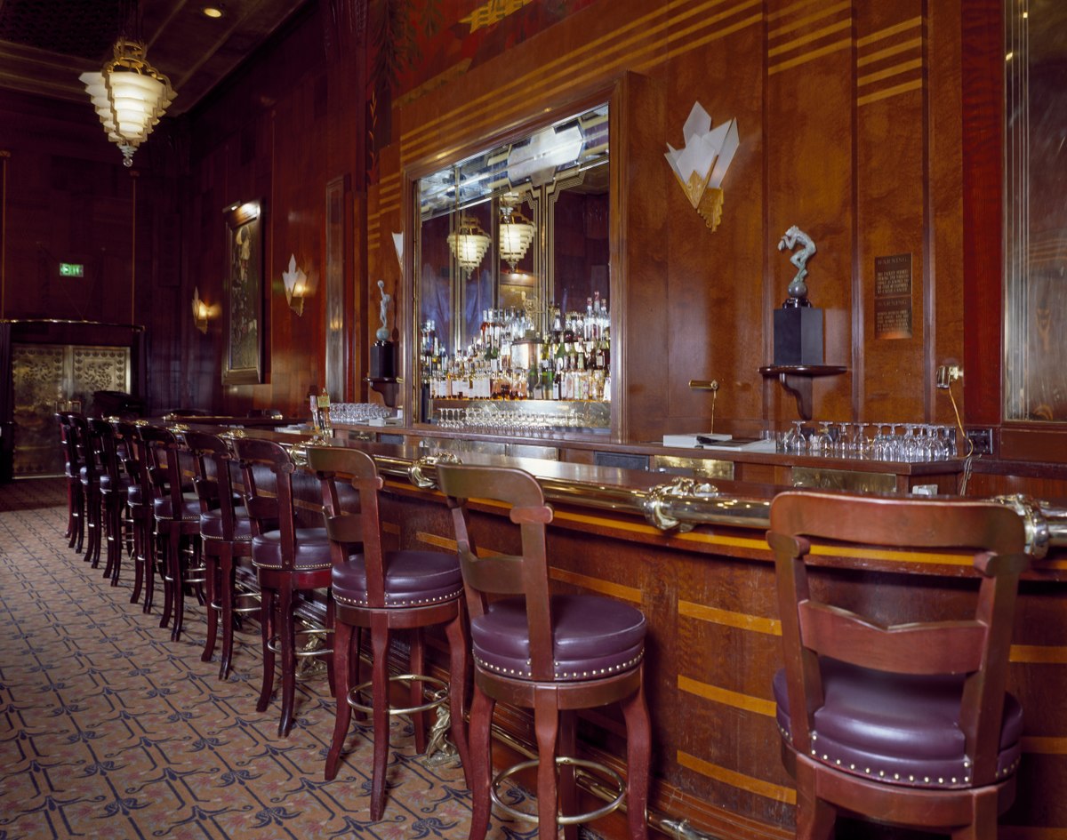 Redwood Room bar at The Clift, elegant wood paneling, ideal for cocktail receptions.