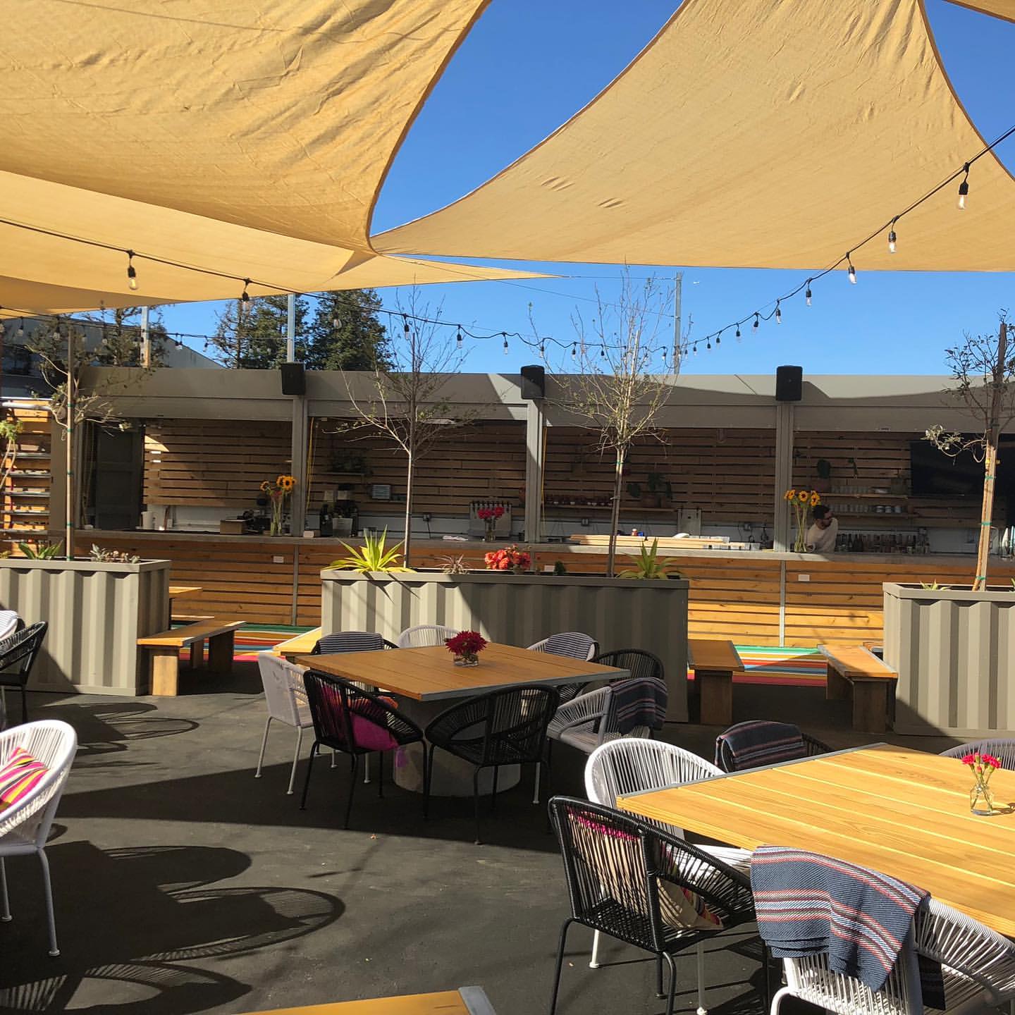 Outdoor parklet at Marzano Restaurant with stylish seating for events and gatherings.