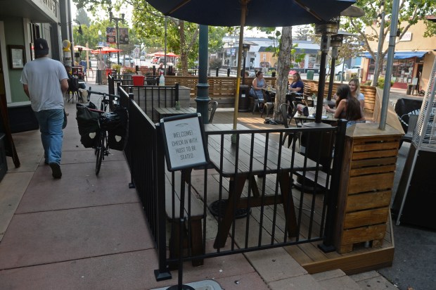 Outdoor parklet at Marzano Restaurant, ideal for casual meetings and networking events.
