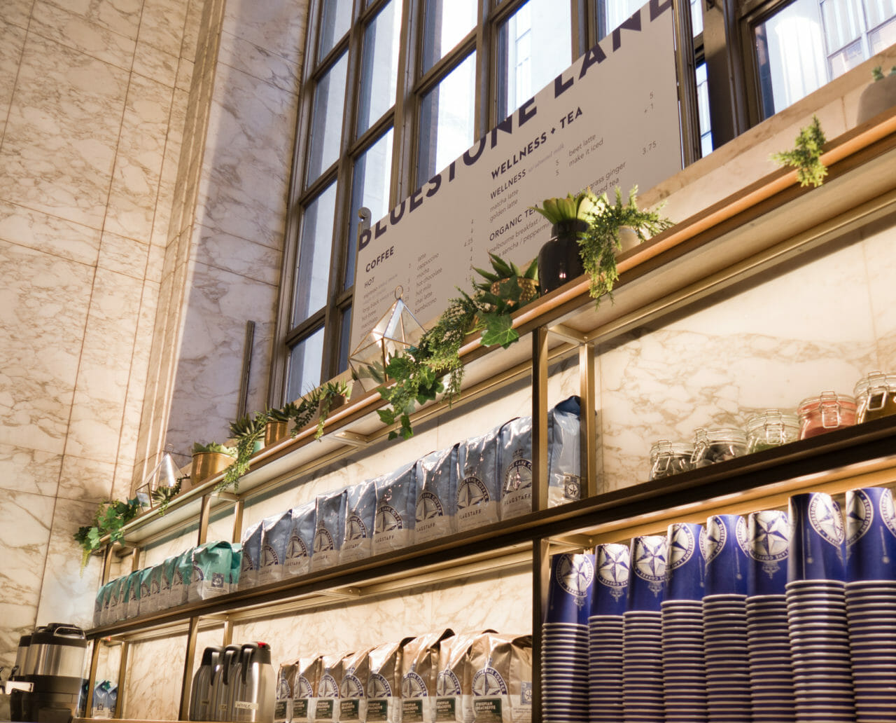 Stylish refreshment station at Bluestone Lane for events, featuring elegant beverage display.
