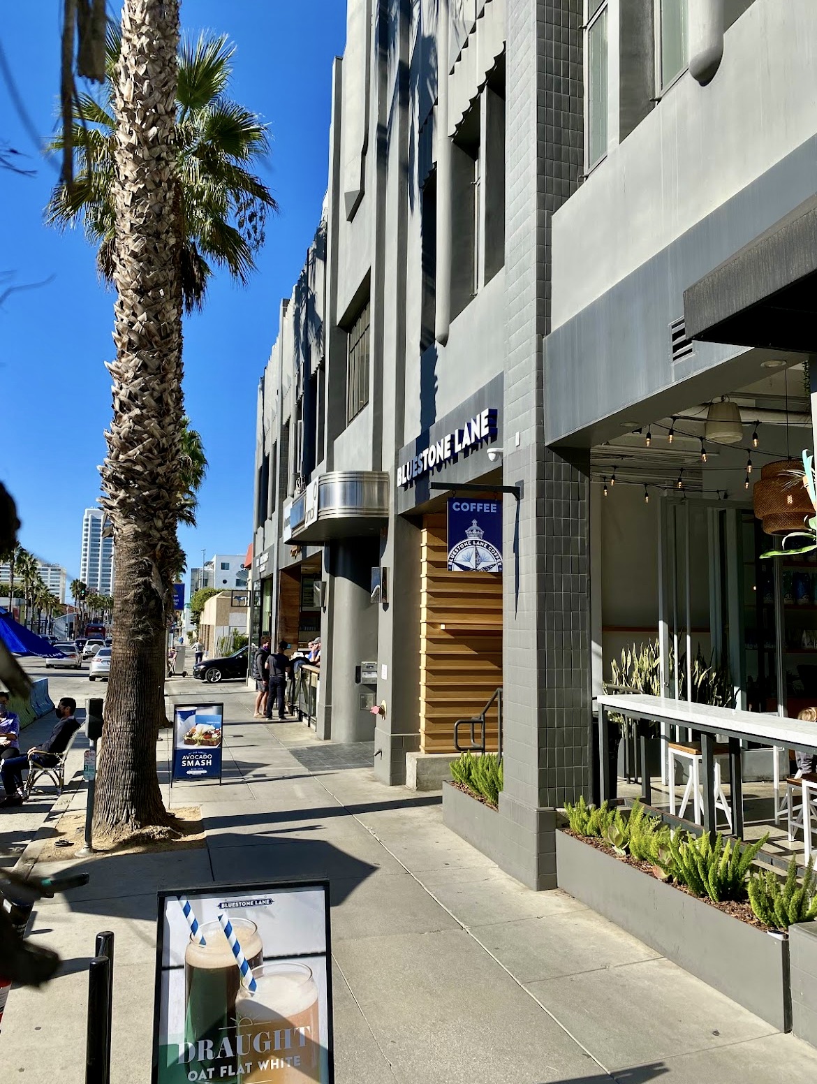 Vibrant Santa Monica café with natural light, perfect for networking events and gatherings.