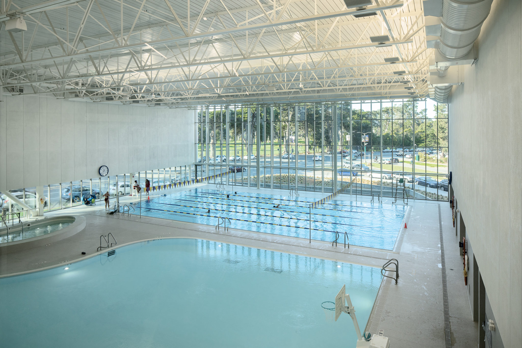 Modern wellness center with swimming pools for aquatic events and retreats.