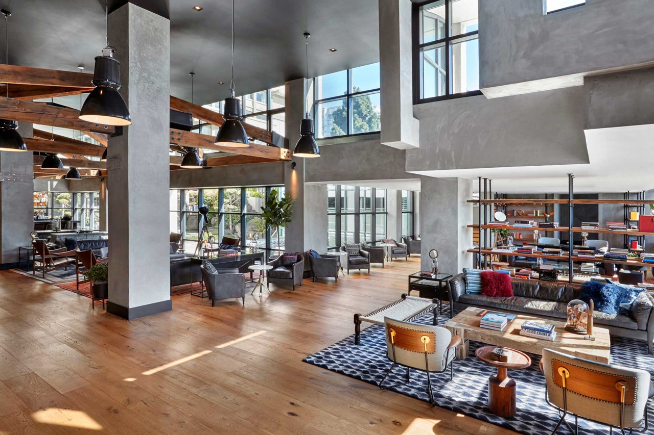 Modern event space at Hotel Kabuki with natural light, ideal for networking and meetings.