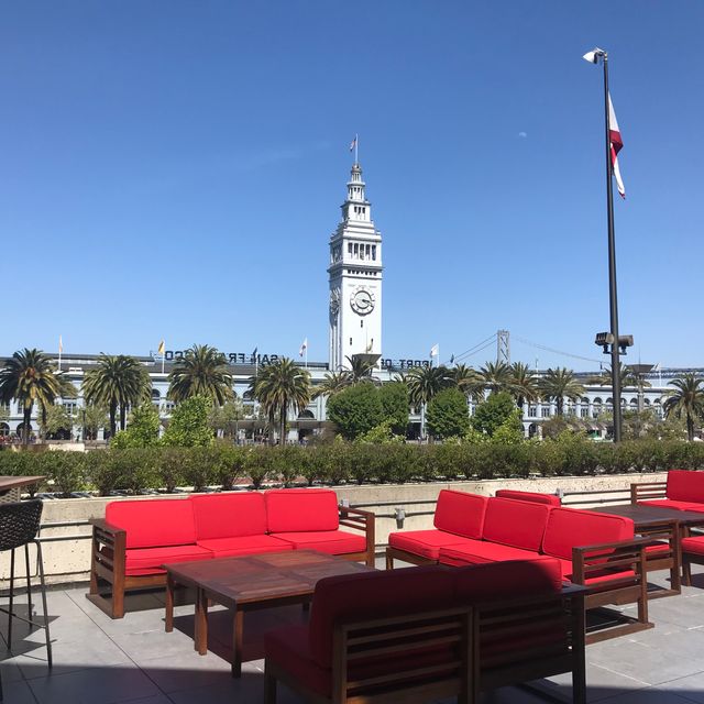 Macau Room at Harborview Restaurant, vibrant outdoor event space with Bay Bridge backdrop.