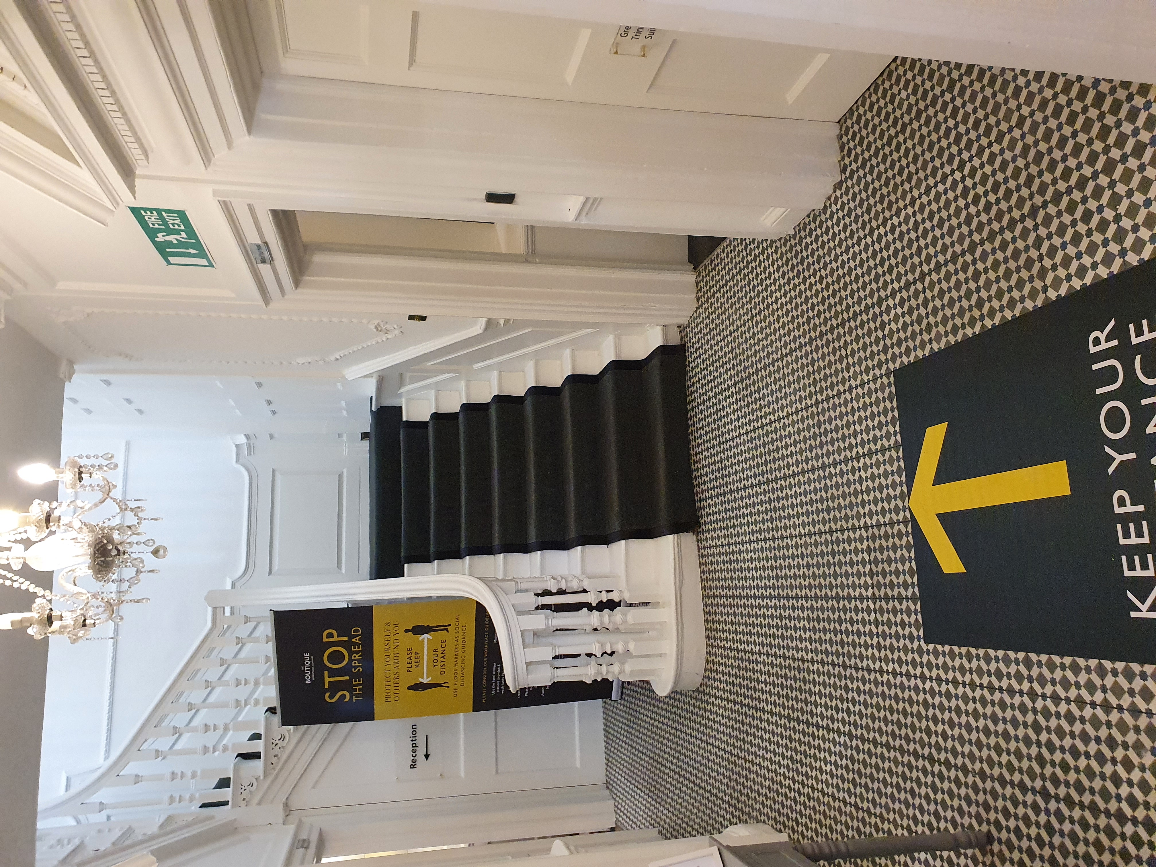 Elegant staircase entrance in The Pilgrim Suite, perfect for formal events and gatherings.