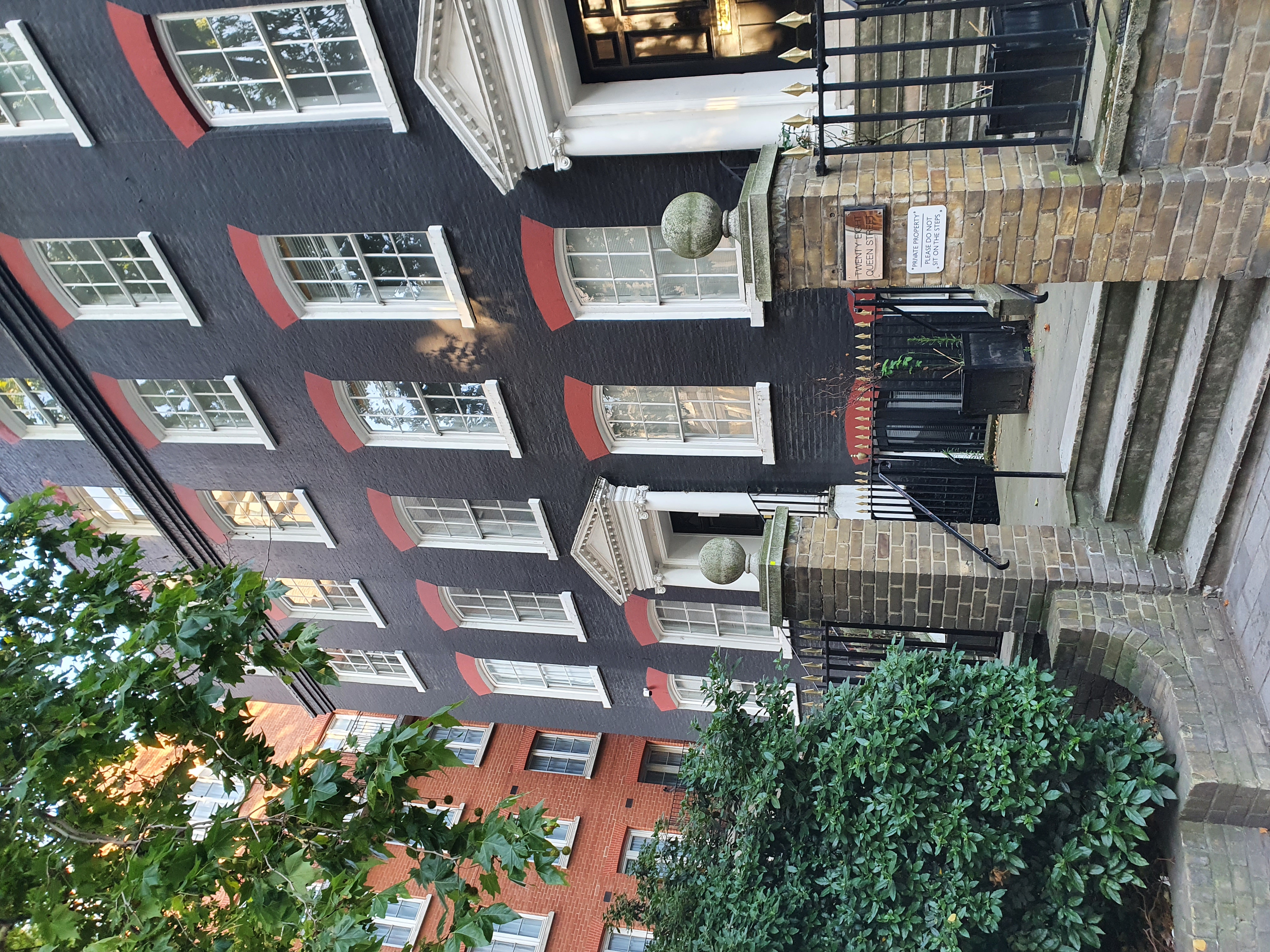 Historic black facade of The Pilgrim Suite, ideal for corporate events and private functions.