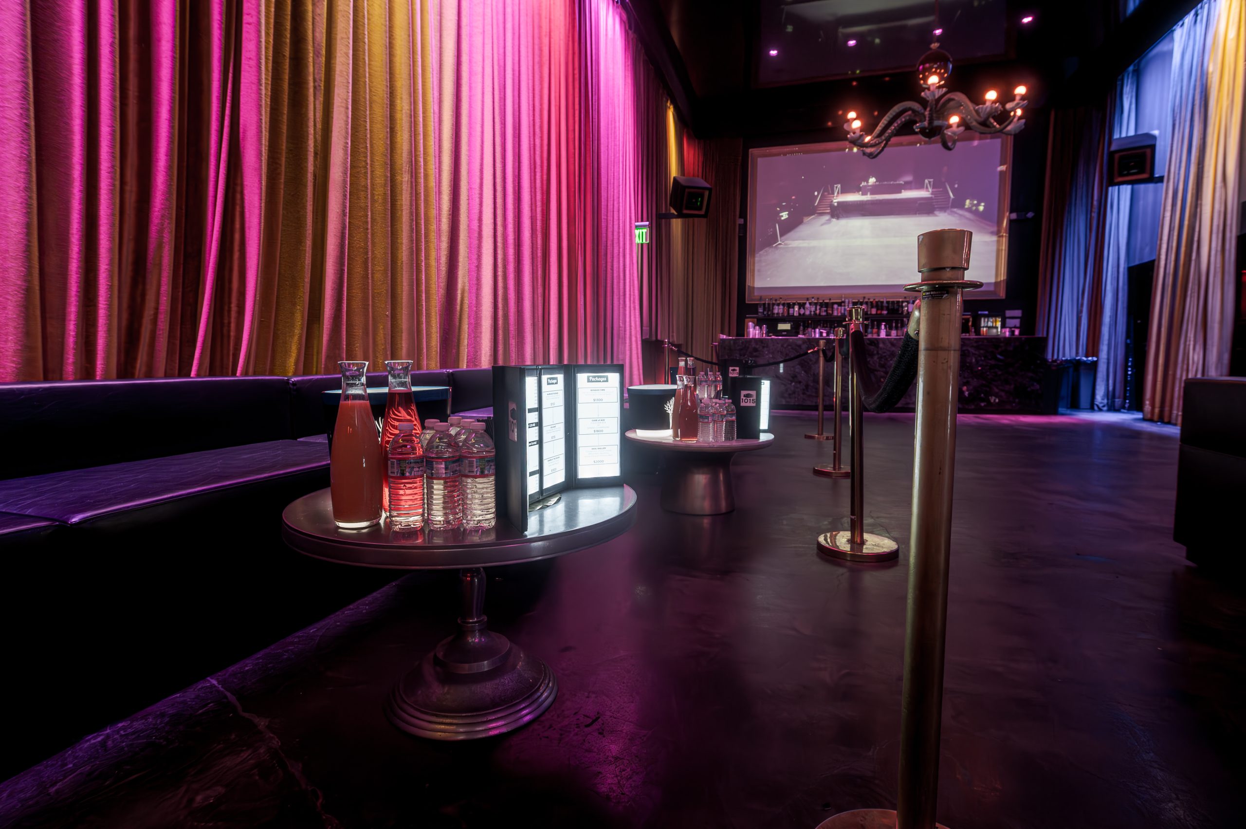 Stylish Lin Lounge event space with vibrant drapery, ideal for upscale gatherings and celebrations.
