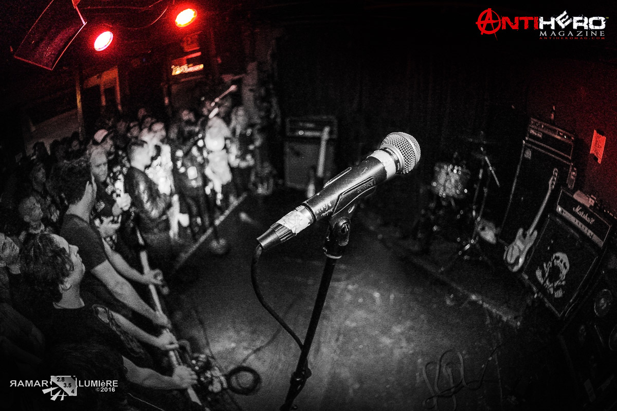 Small stage at Thee Parkside with microphone, vibrant live music event audience.