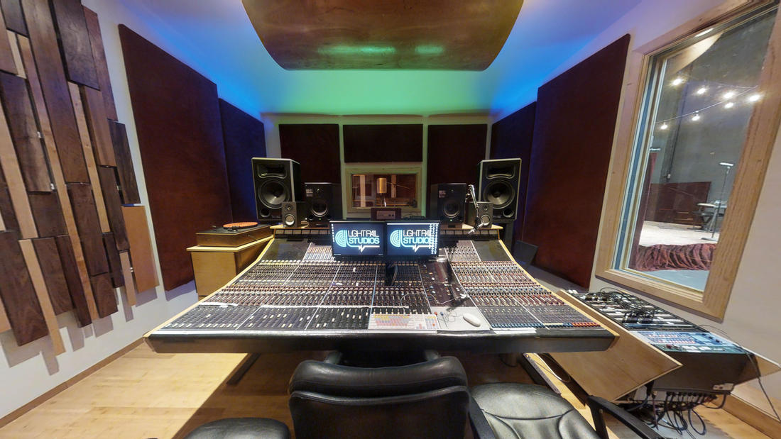 Control Room at Light Rail Studios with large mixing console for music production workshops.
