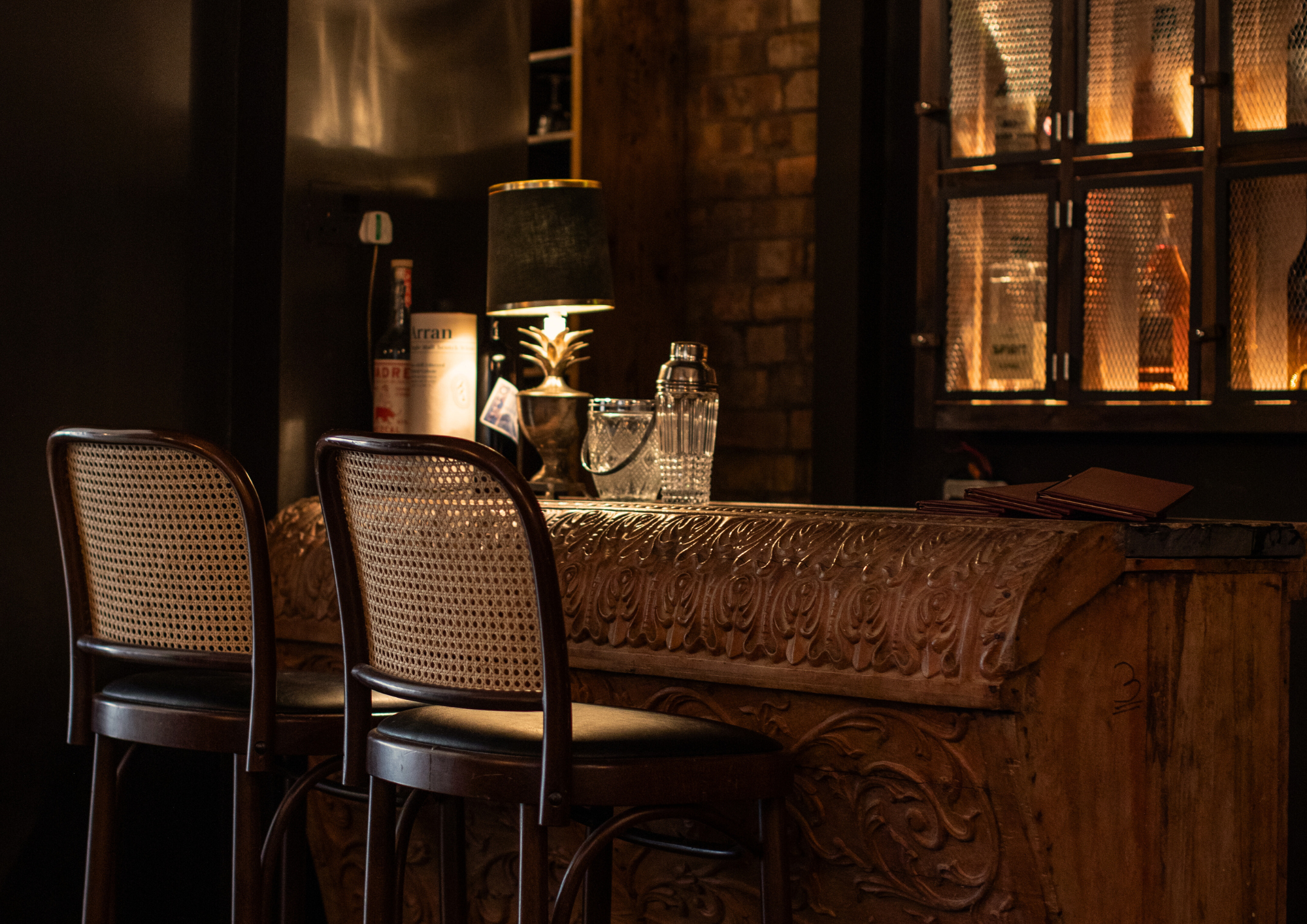 Private dining room at Patron Restaurant with stylish bar, ideal for networking events.