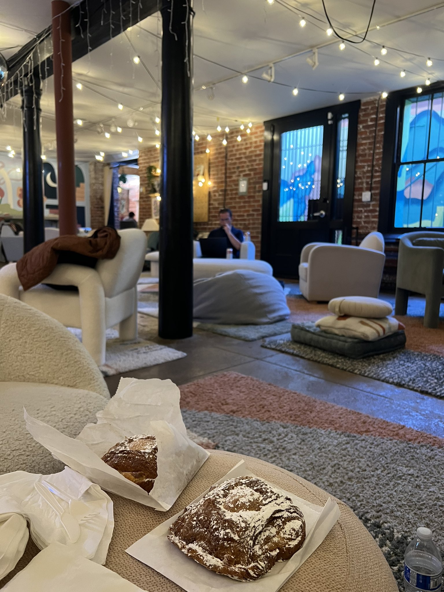 Hogwarts Co-Working Space with cozy seating for brainstorming and networking events.