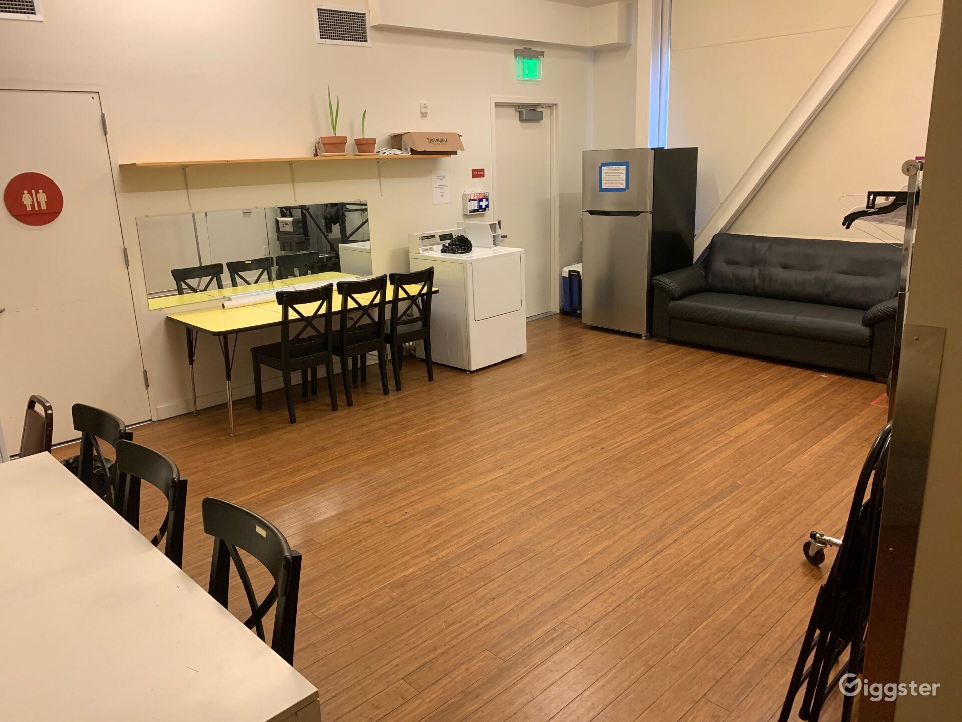 Versatile break room in ODC Theater for meetings and events with natural light.