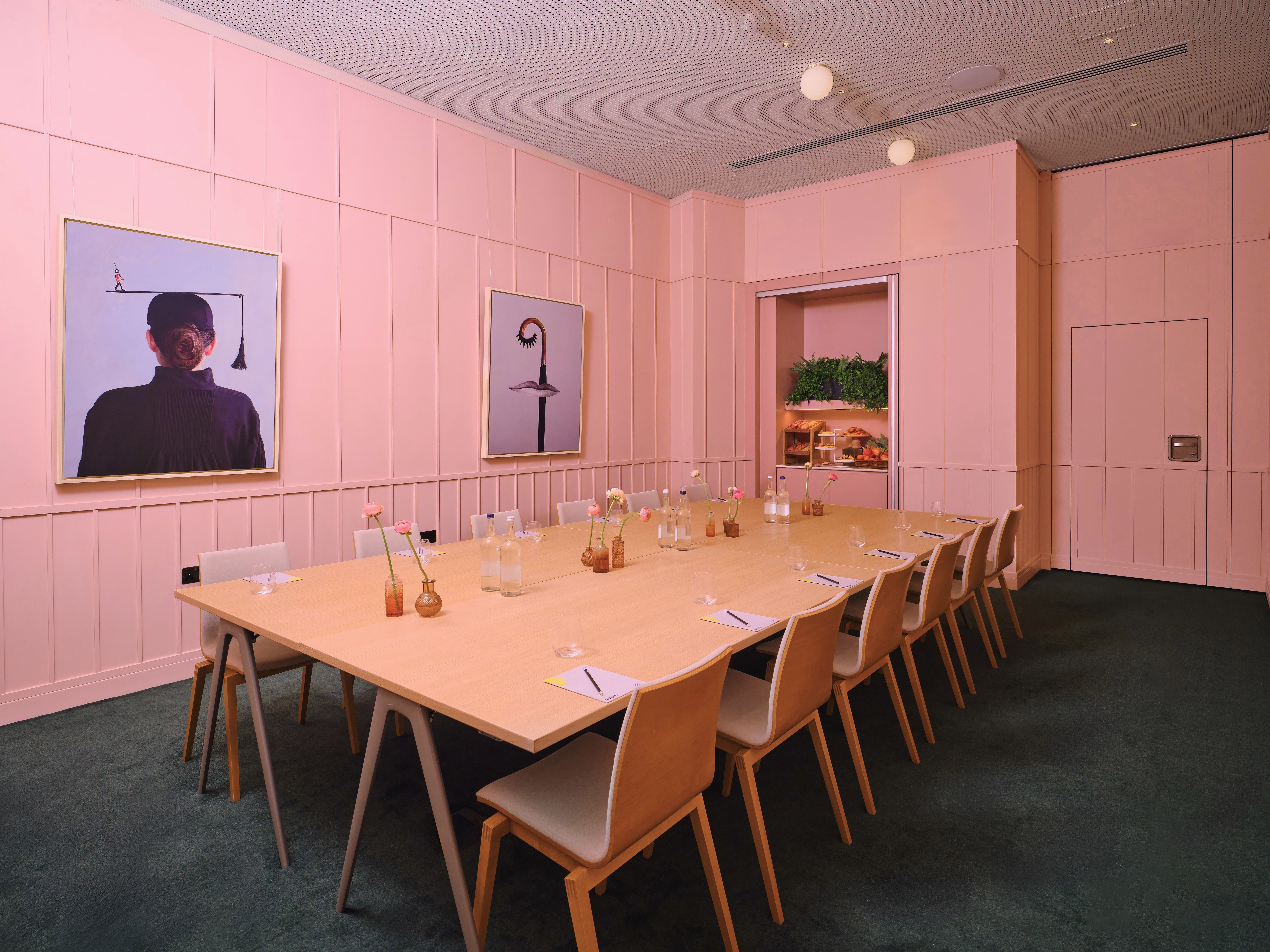 Modern meeting room with pink decor at art'otel London for creative gatherings.