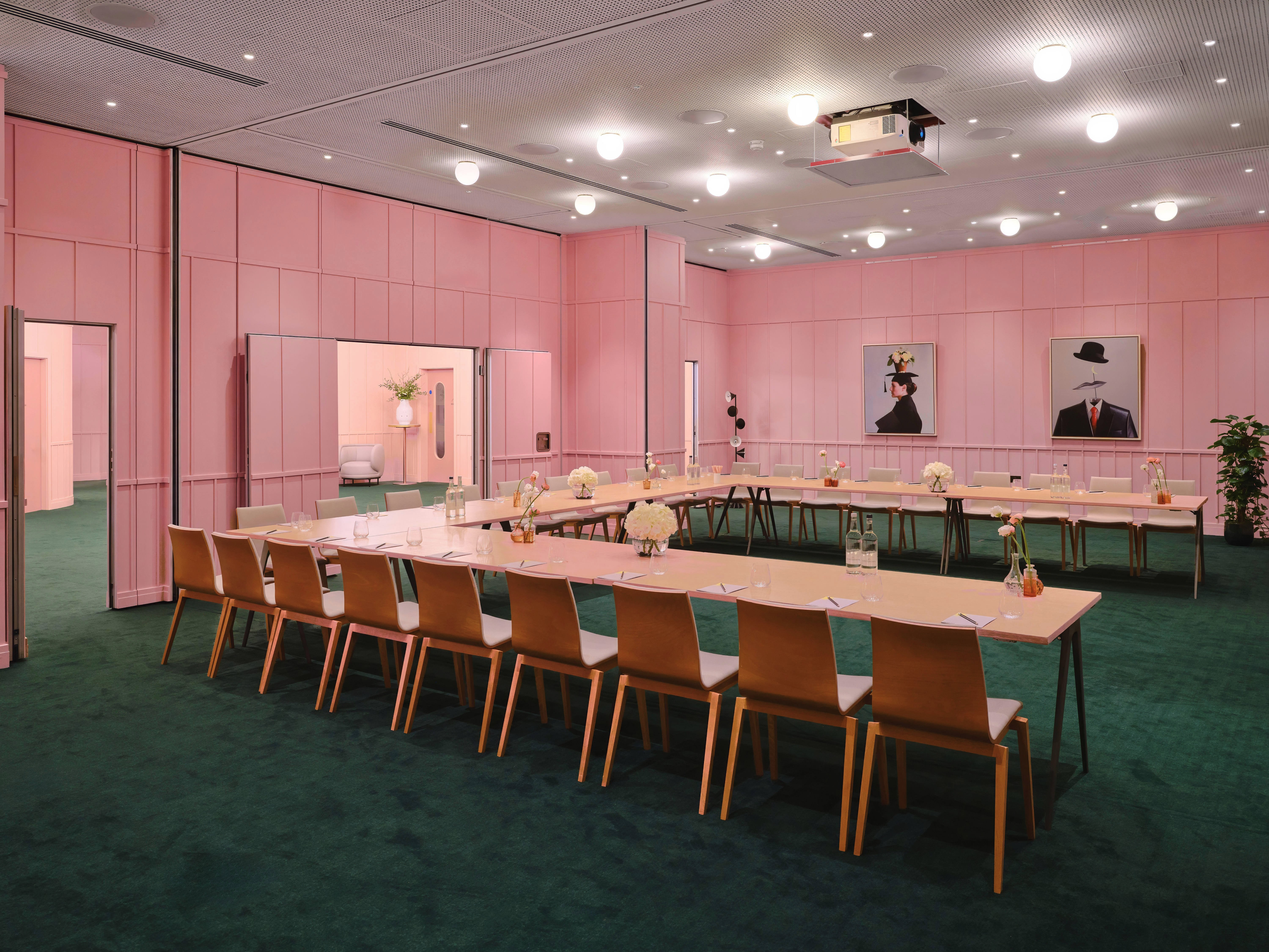 Stylish meeting room with long table, ideal for events and brainstorming at art'otel London.
