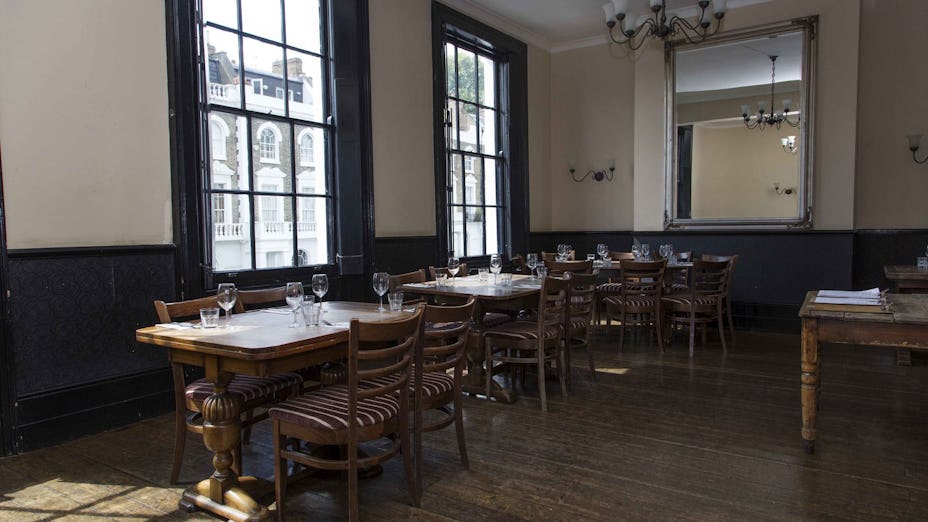 Spacious dining area at The Lanny, perfect for events and gatherings with natural light.