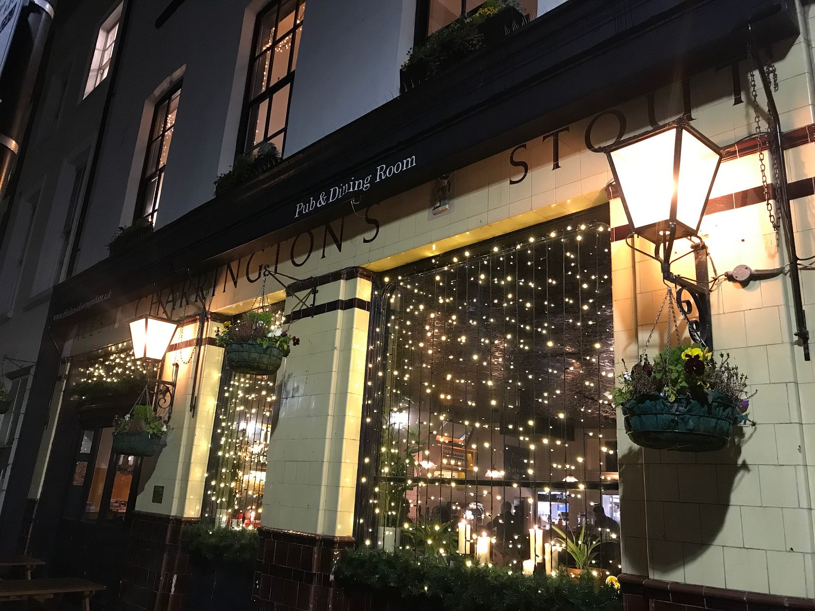 Charming Lansdowne Pub venue with twinkling lights, ideal for intimate gatherings and receptions.