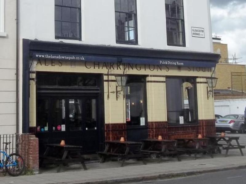 Charming Lansdowne Pub bar with outdoor seating for casual networking events.
